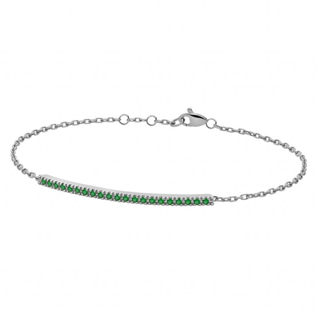 Bracciale mezzo tennis in oro bianco e smeraldi